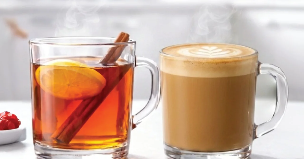 Hot tea with lemon and cinnamon, and a latte, in clear Luxem mugs