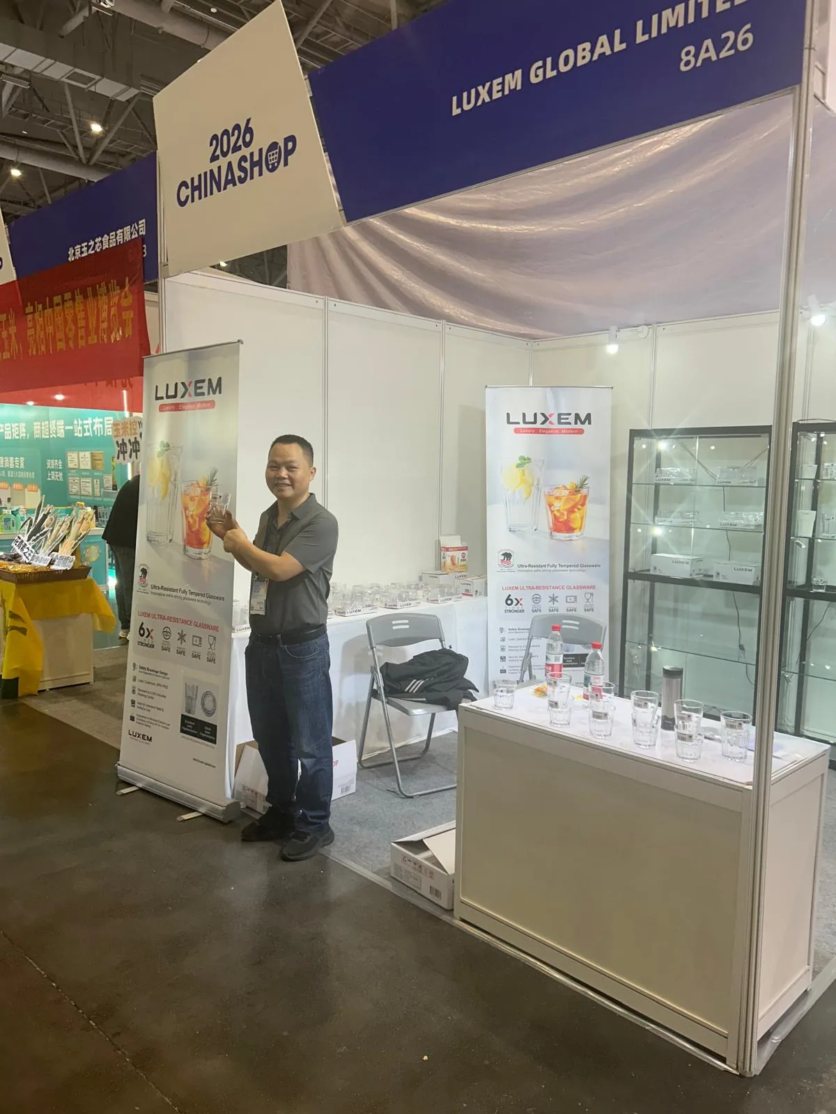 The Luxem Global stand 8A26 at CHINASHOP 2026, with Luxem banners and glassware on display