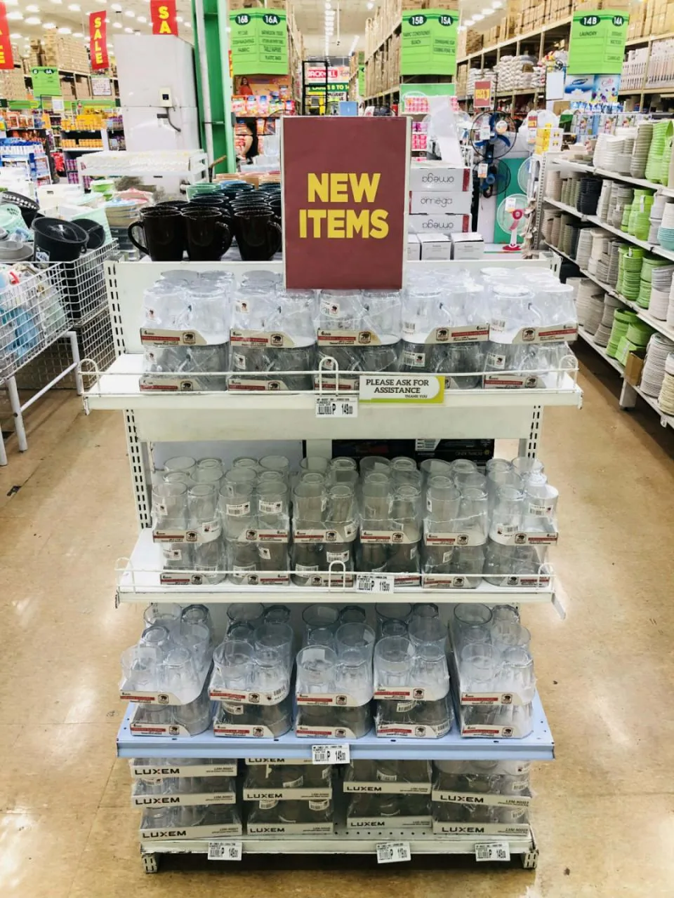 Luxem tempered glass mugs and tumblers on a 'New items' end-cap display at a Puregold supermarket